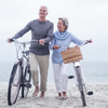 Elderly couple riding bicycles