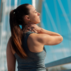 Athletic woman experiencing neck pain