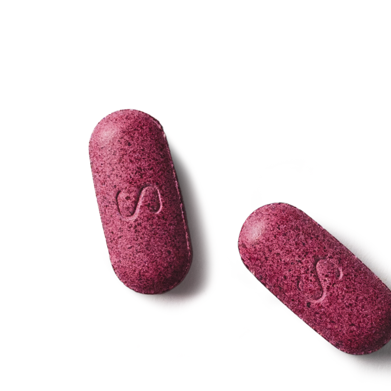 Two heart tablets on a white background