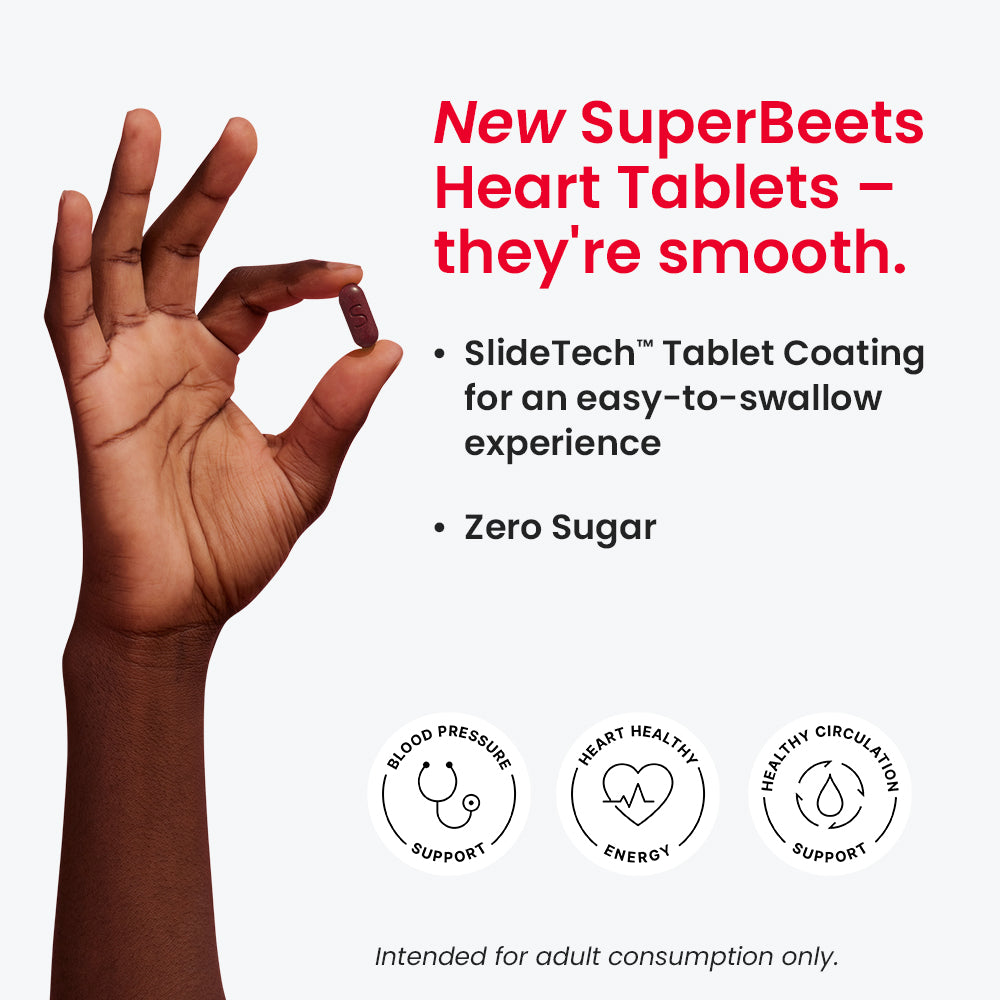 Hand holding a Heart Tablet with text 'New SuperBeets Heart Tablets - they're smooth. SlideTech Tablet Coating for an easy-to-swallow experience. Zero Sugar'